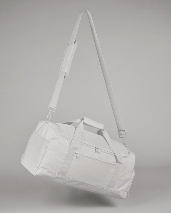 A white bag is depicted in this image, with a handle attached to it. The bag is hanging in the air, and the background is white.