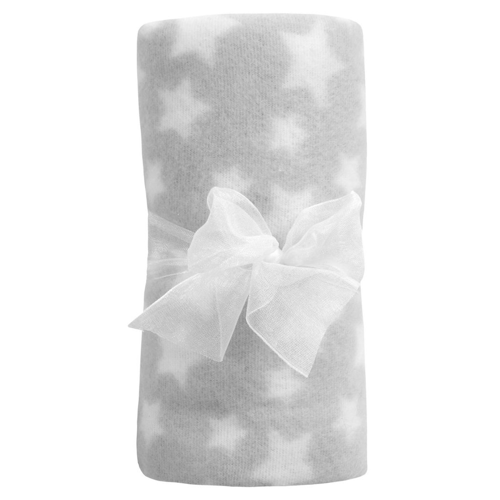 A white and grey blanket is depicted in this image, featuring a white ribbon and a bow. The blanket has a grey and white design with stars and stripes. The image is presented in a white background.