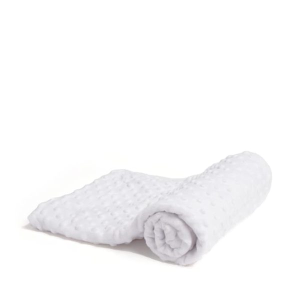 A white cloth is depicted in this image, with a few white dots visible on its surface. The cloth is placed on a white surface, which is also white in color.