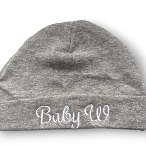 A grey beanie hat is the central focus of this image, with the word "BabY W" embroidered on it. The background is white.