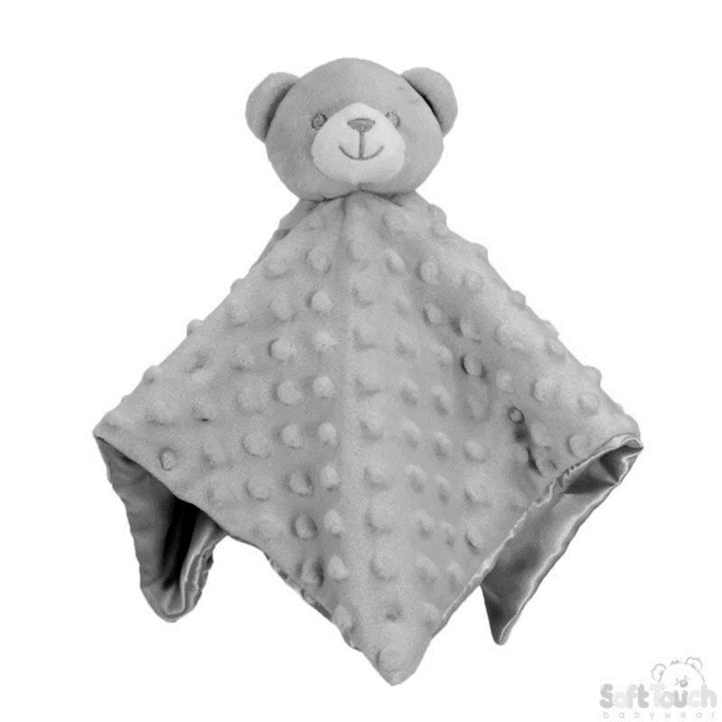 A grey-colored teddy bear is the central focus of this image, with a white background. The bear is adorned with black and white dots, giving it a fuzzy appearance.