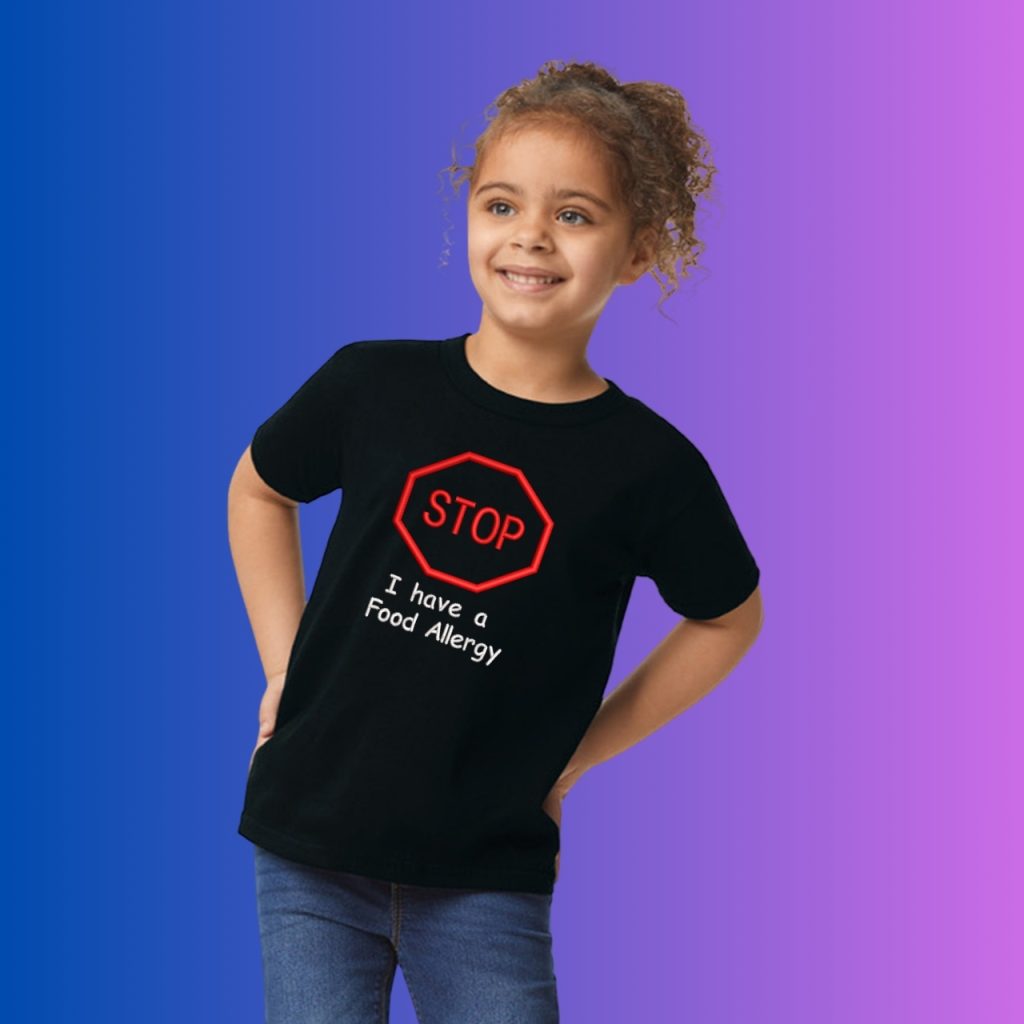 A girl is depicted in this image, wearing a black t-shirt with the word "stop" written on it. The background is a combination of blue and purple colors.